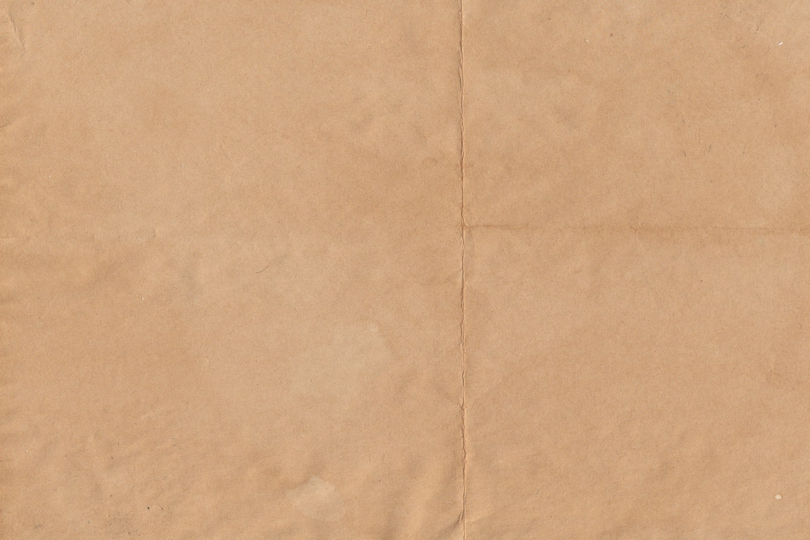 a piece of brown paper with a white background