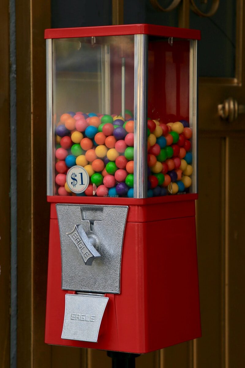 red and white candy dispenser